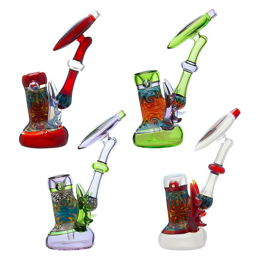 Handcrafted heady glass bubbler featuring vibrant red green and purple wigwag swirls with decorative glass spikes and ergonomic mouthpiece for smooth water filtration.