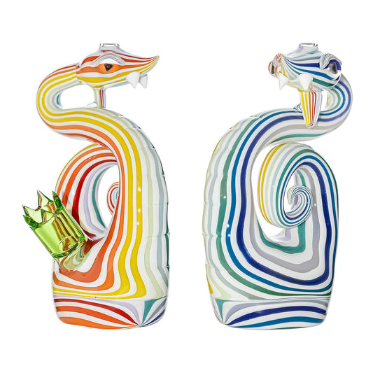 Heady wigwag snake dab rig featuring vibrant orange, yellow, and blue striped glass patterns with shimmering opal eyes and a green glass joint.