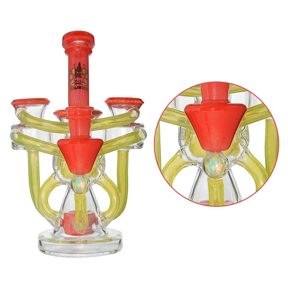 Calibear artistic recycler dab rig with encased opal and colorful multi-chamber borosilicate glass recycler design.
