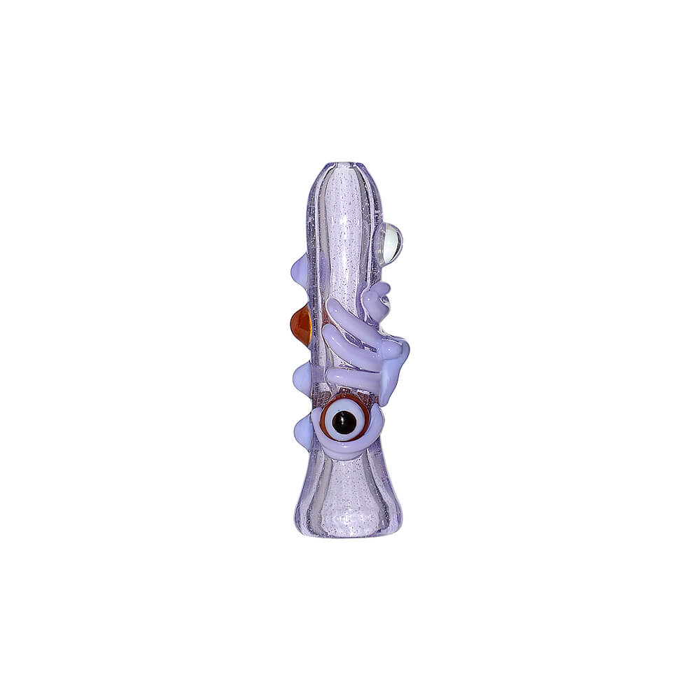 CaliBear Dual Face handcrafted glass pipe with vibrant purple and yellow colors, showing detailed artistic facial expressions on a white background.
