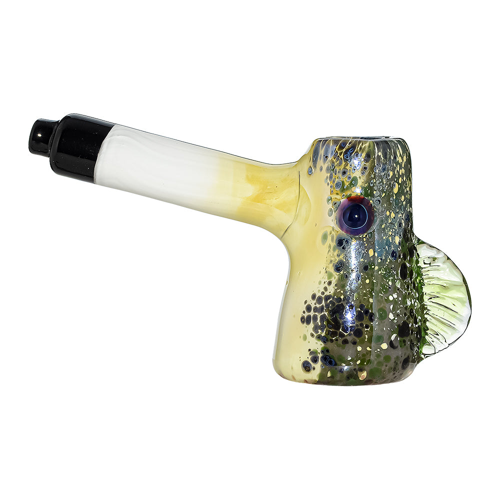 CaliBear Glass Puffer Fish hand pipe featuring a yellow-green speckled body, large eyes, and a white stem with black mouthpiece on a white background.