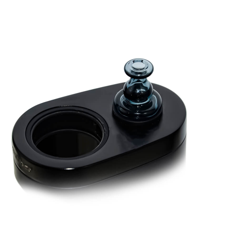 Calibear Classic Bell Vortex Spinner Cap (Transparent Black) displayed on a black device base, showing its compact bell-shaped glass body and fitted appearance