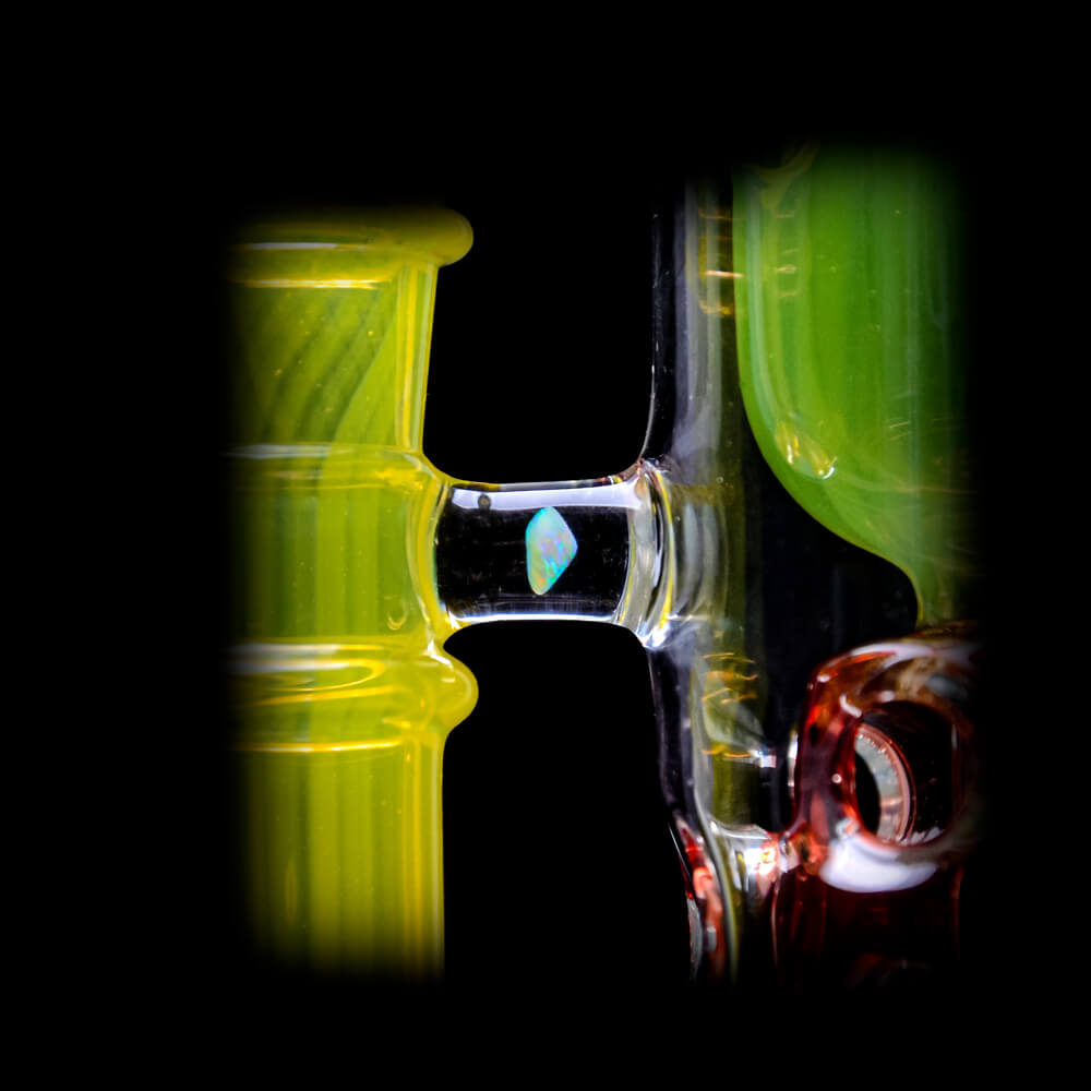 CaliBear 8.5 inch Kickback Straight Fab Torus dab rig featuring yellow accents, a red Seed of Life percolator, and an encased opal.