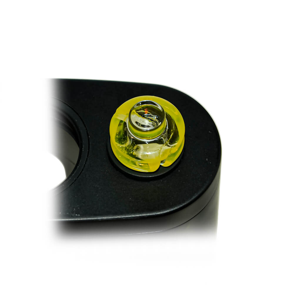 Calibear Premium Spinner Carb Cap (Lemon Candy), installed top view showing the circular airflow opening, translucent yellow glass rings and spiral channel details