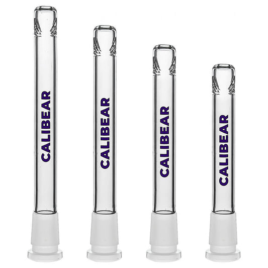 Four clear glass Calibear Premium Tri-Seed Slotted Ice Pinch Downstems in varying lengths, showcasing the unique triangular ice pinch restriction at the tip and clear embossed side logos.