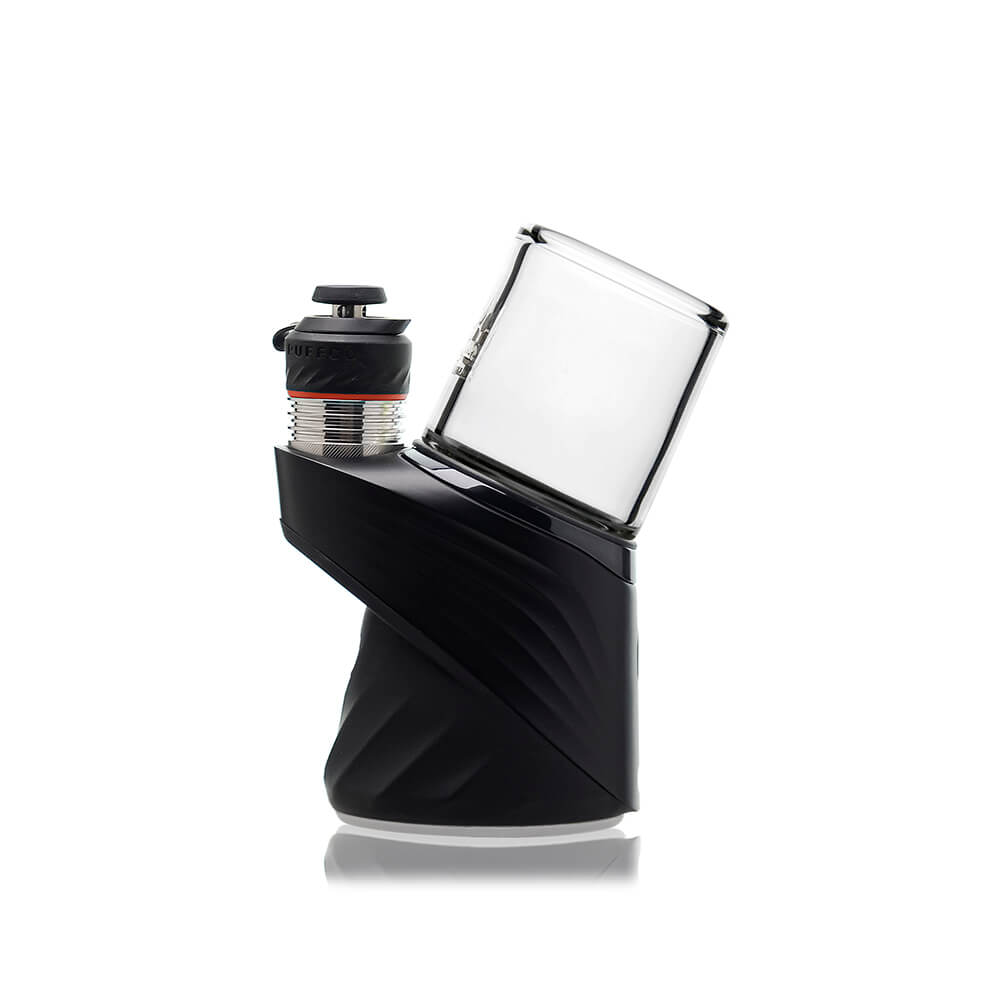 Calibear Puffco Proxy Core To Peak Glass Adaptor (Clear) installed on a Puffco Peak base, showing the compact cylindrical glass profile and secure fit