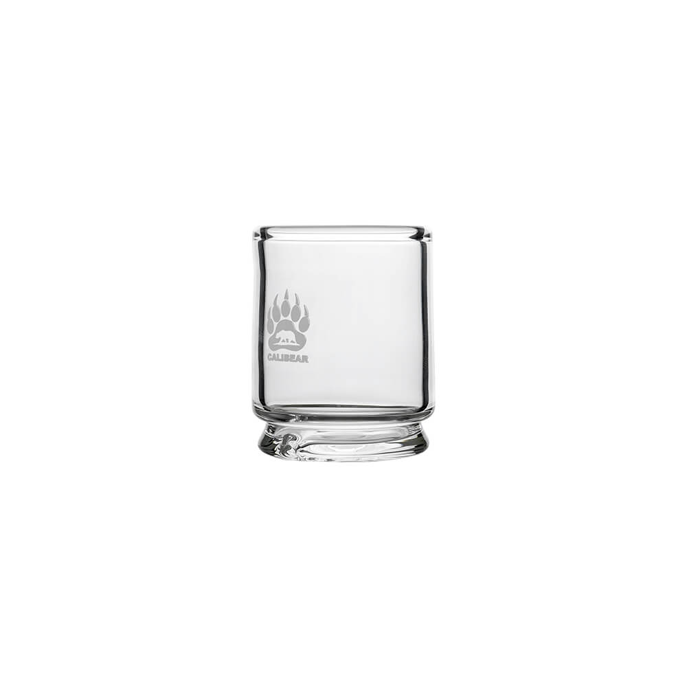Angled view of Calibear Puffco Proxy Core To Peak Glass Adaptor (Clear), highlighting the smooth cylindrical glass wall and reinforced lower connection