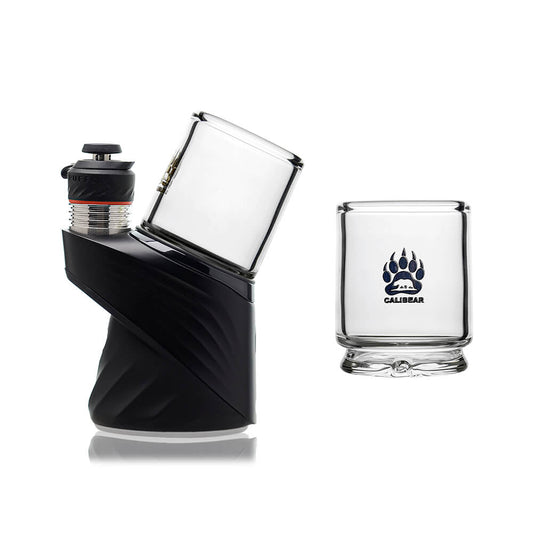Calibear Puffco Proxy Core To Peak Glass Adaptor (Clear) shown installed on a Puffco Peak base alongside the standalone cylindrical glass adaptor