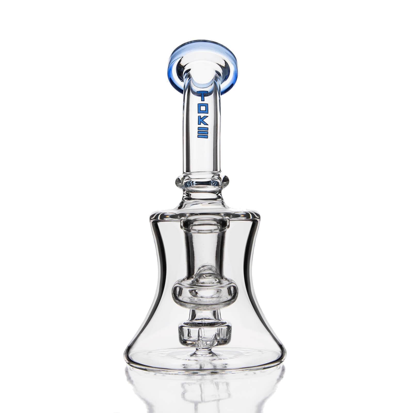 Clear beaker style glass water pipe with blue accented angled neck and built-in showerhead diffuser.