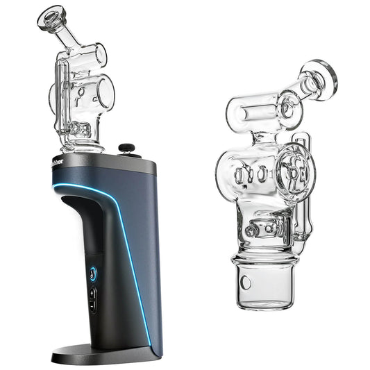 Calibear Swiss Barrel Glass Attachment for Dr. Dabber Switch 2 shown mounted on device and standalone — featuring a compact clear borosilicate barrel-shaped body with Swiss-style circular percolator disc, dual side porthole windows, internal recycler loop, angled mouthpiece with disc cap, and precision-fit Switch 2 base adapter, displayed against white background.