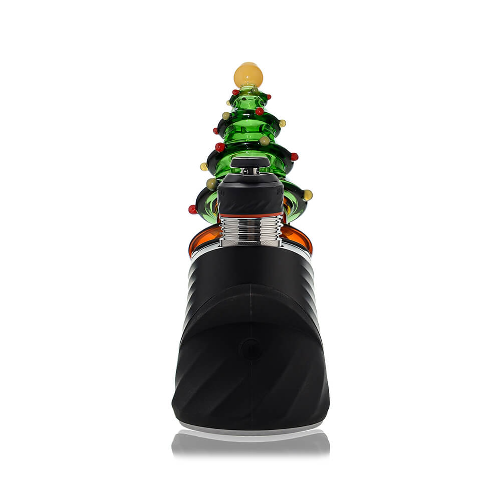 Calibear Christmas tree glass top attachment with layered green branches shown on a Puffco Peak device and standalone.