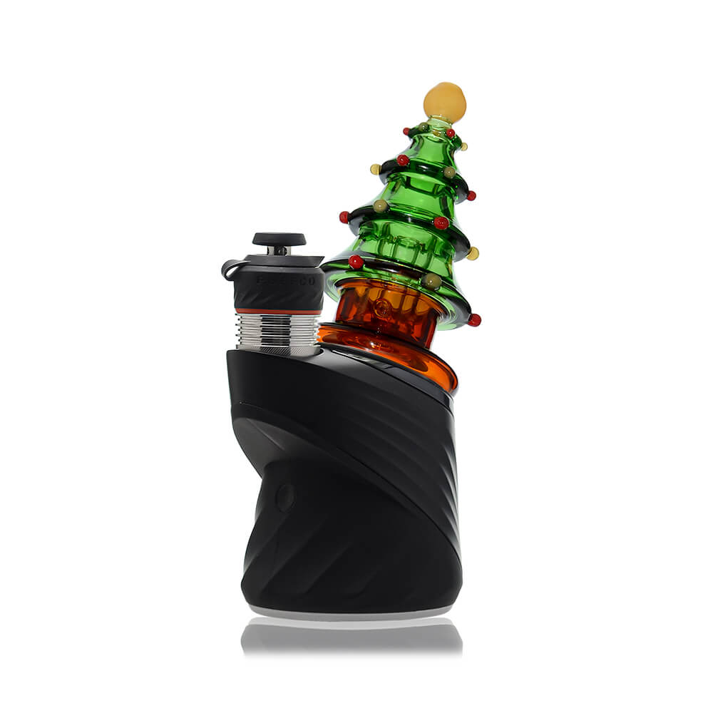 Calibear Christmas tree glass top attachment with layered green branches shown on a Puffco Peak device and standalone.