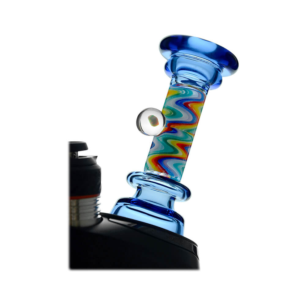A collection of CaliBear glass attachments for Puffco Peak OG and Pro featuring vibrant wigwag swirl patterns in multiple colors and encased opal accents.
