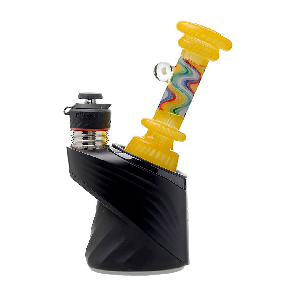 A collection of CaliBear glass attachments for Puffco Peak OG and Pro featuring vibrant wigwag swirl patterns in multiple colors and encased opal accents.