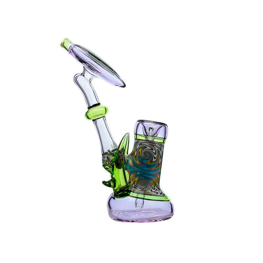 Handcrafted heady glass bubbler featuring vibrant red green and purple wigwag swirls with decorative glass spikes and ergonomic mouthpiece for smooth water filtration.