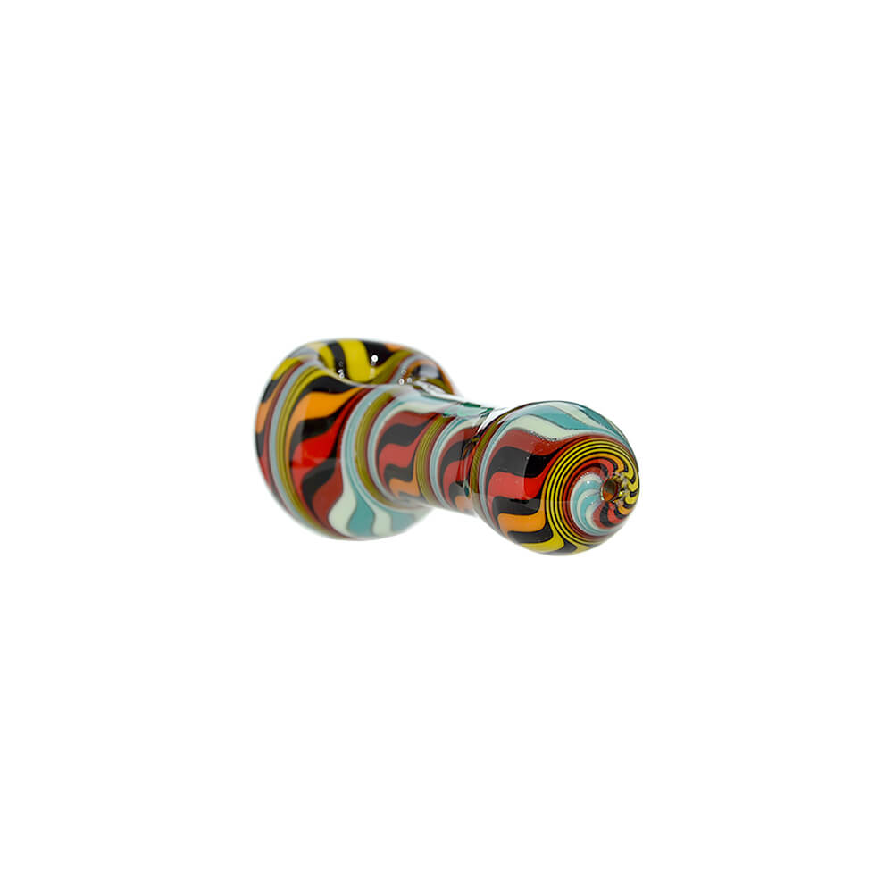 Five hand-blown glass spoon pipes featuring vibrant colorful wigwag patterns in yellow, orange, blue, and black, each marked with a green Calibear logo.