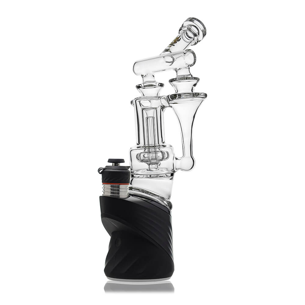 Calibear Premium DUO RBR Recycler clear glass attachment featuring a dual-drain external recycling system and angled neck, shown standalone and docked on a Puffco Peak Pro.