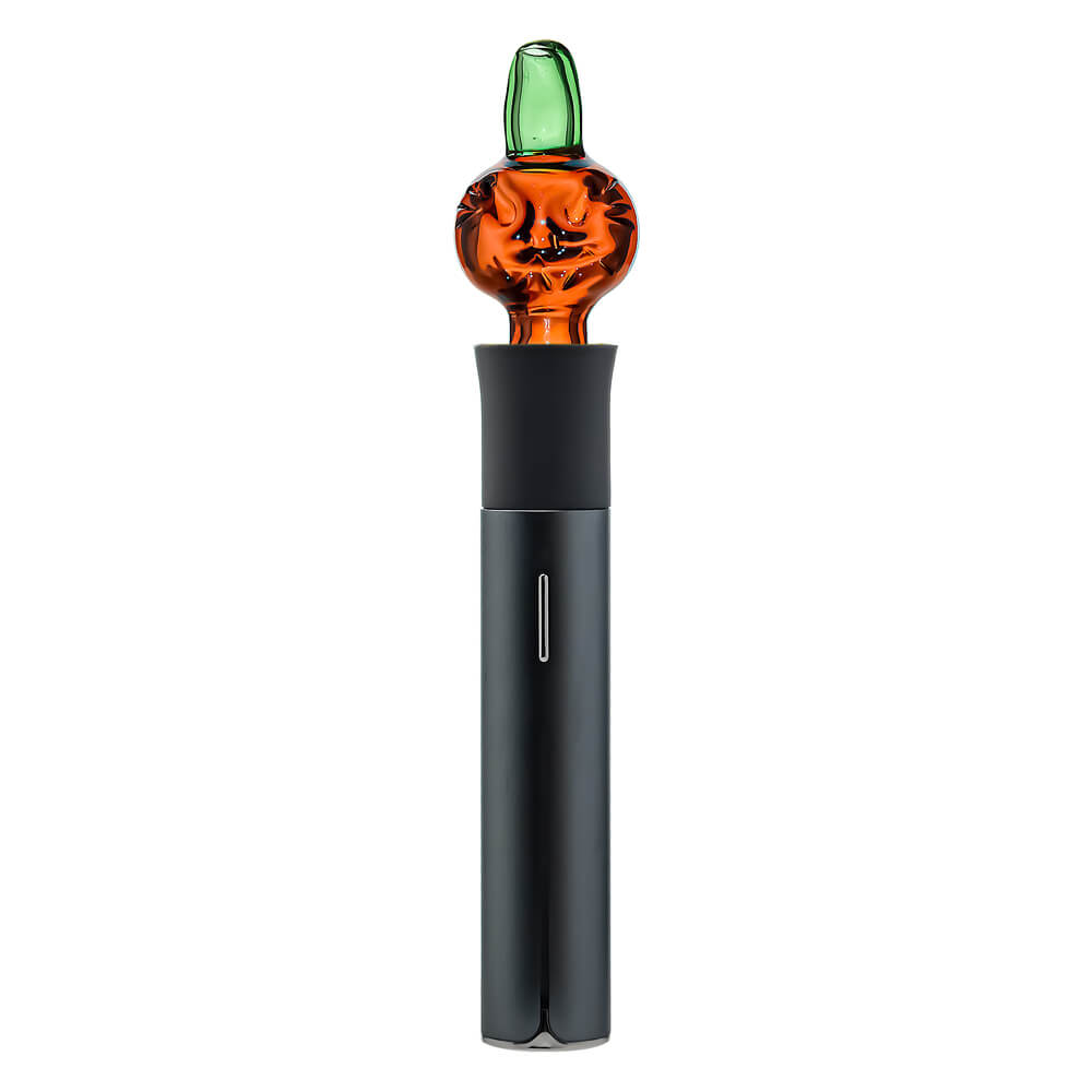 Two orange Pumpkin Jack glass attachments for the Pivot device featuring carved face details and green stem mouthpieces on a white background.