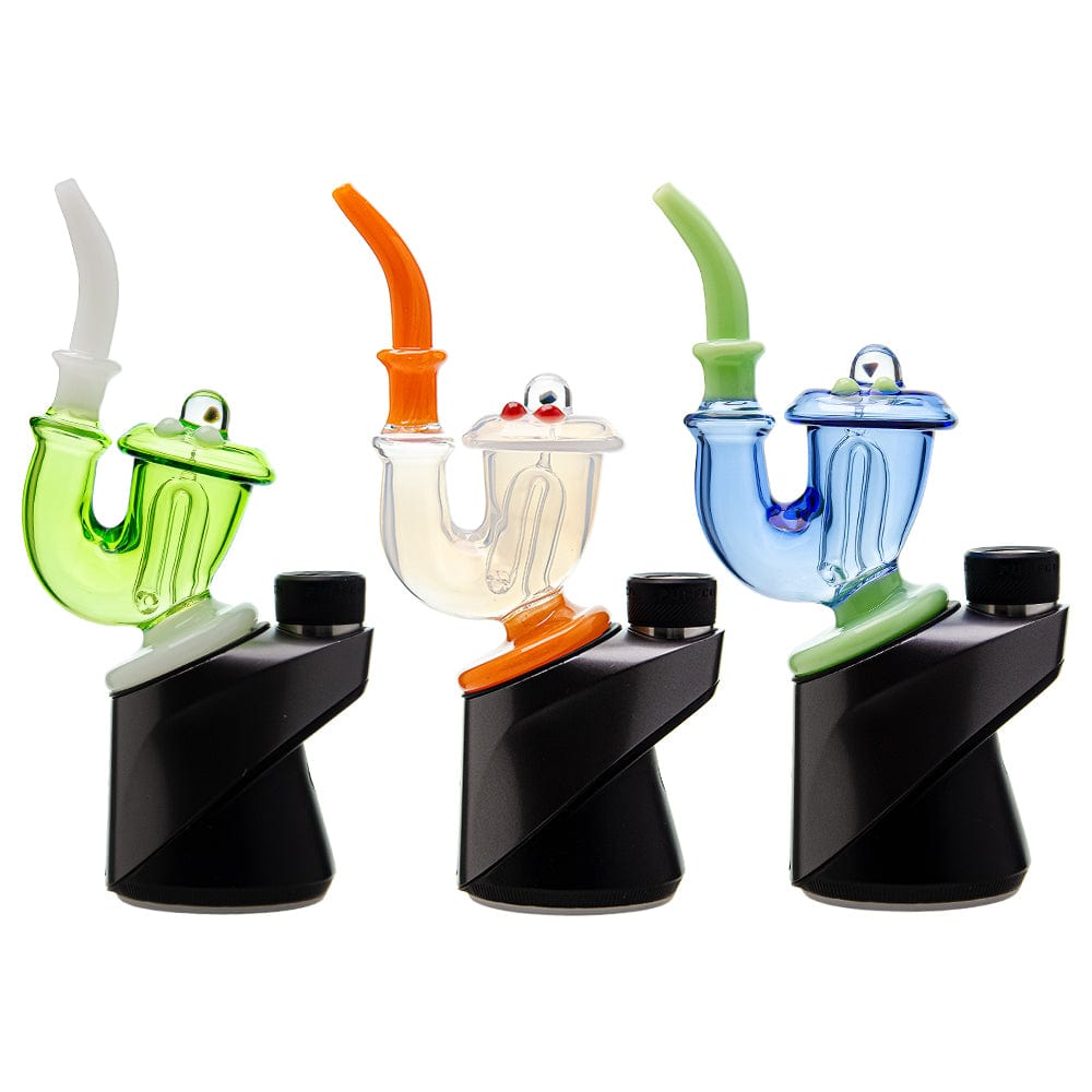 Three Calibear Sherlock Pipe glass attachments in green, clear-orange, and blue colorways mounted onto black Puffco Peak e-rig bases, showcasing curved necks and internal styling.
