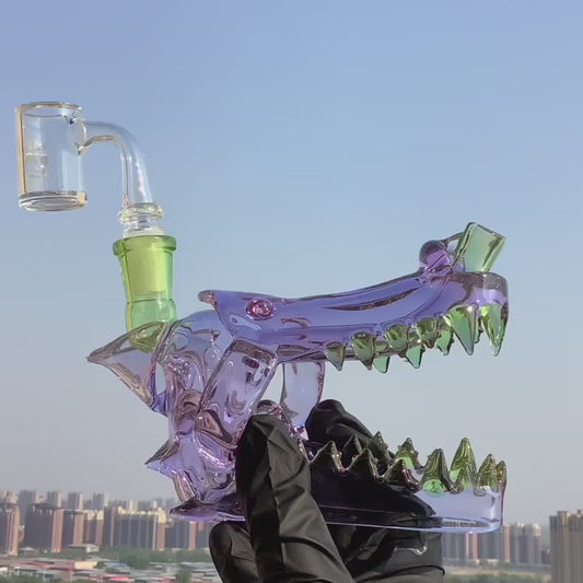 Calibear wolf head glass rig with sculpted skull design and sharp teeth, handcrafted borosilicate heady glass smoking rig.