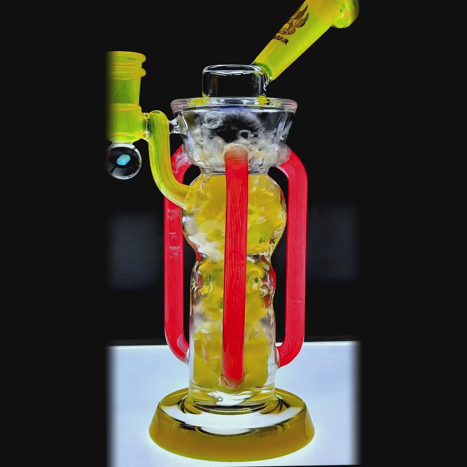 Function video of CALIBEAR COLORFLOW RECYCLER DAB RIG- Premium borosilicate glass dab rig from Calibear Glass. Ideal for dabbing, providing smooth hits and durability. Shop high-quality dab rigs, water pipes, bongs, erig glasses and glass smoking accessories at Calibear Glass. Elevate your smoking experience with a durable and stylish glass dab rig. Free shipping on all orders.
