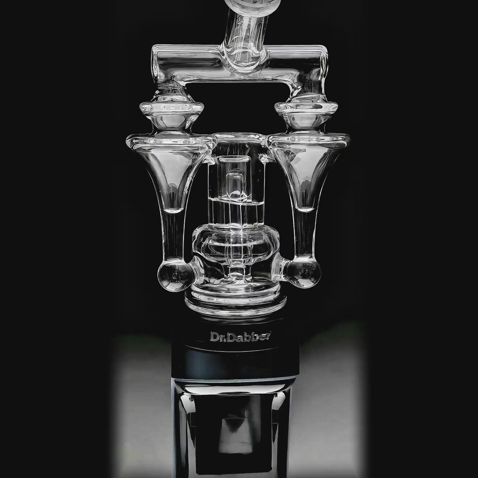Calibear Duo RBR Recycler Glass Attachment for Dr. Dabber Switch 2 function video, shown attached to a blue Switch 2 device and standalone, featuring intricate dual RBR recycler pathways and clear borosilicate glass.