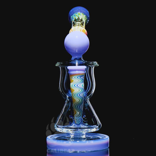 HEADY WIGWAG KLEIN RECYCLER WITH ENCASED OPAL- Premium borosilicate glass dab rig from Calibear Glass. Ideal for dabbing, providing smooth hits and durability. Shop high-quality dab rigs, water pipes, bongs, erig glasses and glass smoking accessories at Calibear Glass. Elevate your smoking experience with a durable and stylish glass dab rig. Free shipping on all orders.