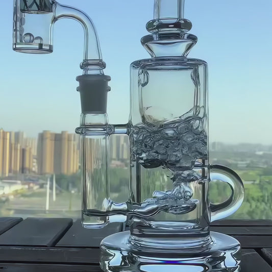 KLEIN RECYCLER-CLEAR- Premium borosilicate glass dab rig from Calibear Glass. Ideal for dabbing, providing smooth hits and durability. Shop high-quality dab rigs, water pipes, bongs, erig glasses and glass smoking accessories at Calibear Glass. Elevate your smoking experience with a durable and stylish glass dab rig. Free shipping on all orders