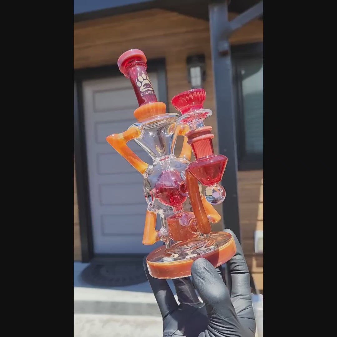 demonstration and function video of CaliBear Premium EXO 8 inch recycler rig with encased opal and Seed of Life perc.
