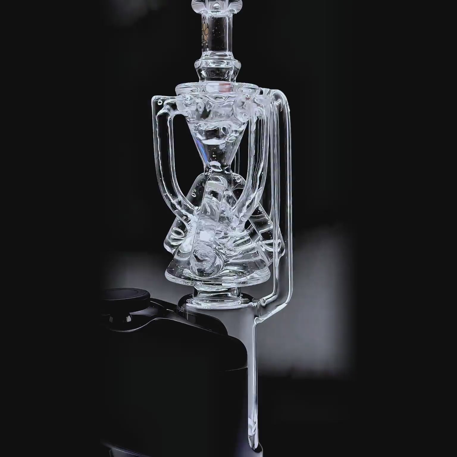 function video of Calibear Tricycler clear glass attachment installed on a Dr. Dabber Switch Go device