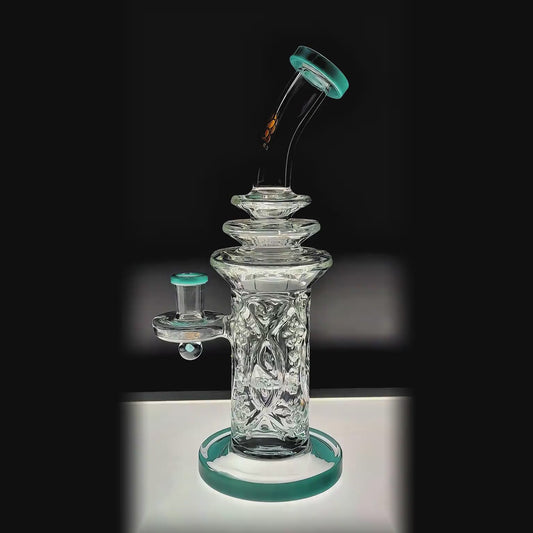 TIERED HELIX PILLAR DAB RIG - Premium borosilicate glass dab rig from Calibear Glass. Ideal for dabbing, providing smooth hits and durability. Shop high-quality dab rigs, water pipes, bongs, erig glasses and glass smoking accessories at Calibear Glass. Elevate your smoking experience with a durable and stylish glass dab rig. Free shipping on all orders.