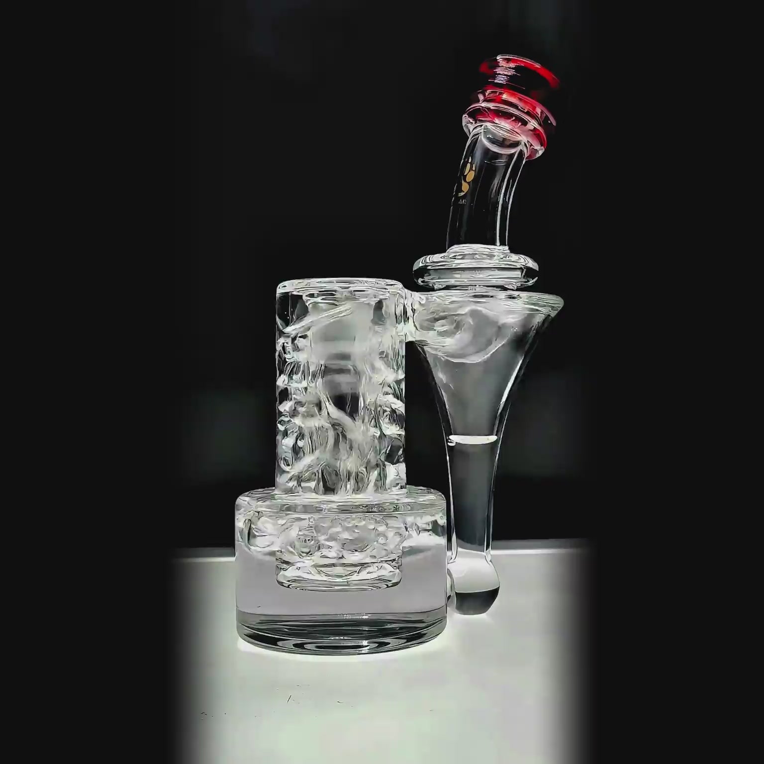 function video of Calibear Premium RBR Recycler with Wave Perc and US color glass mouthpiece, clear borosilicate body, and wave perc filtration