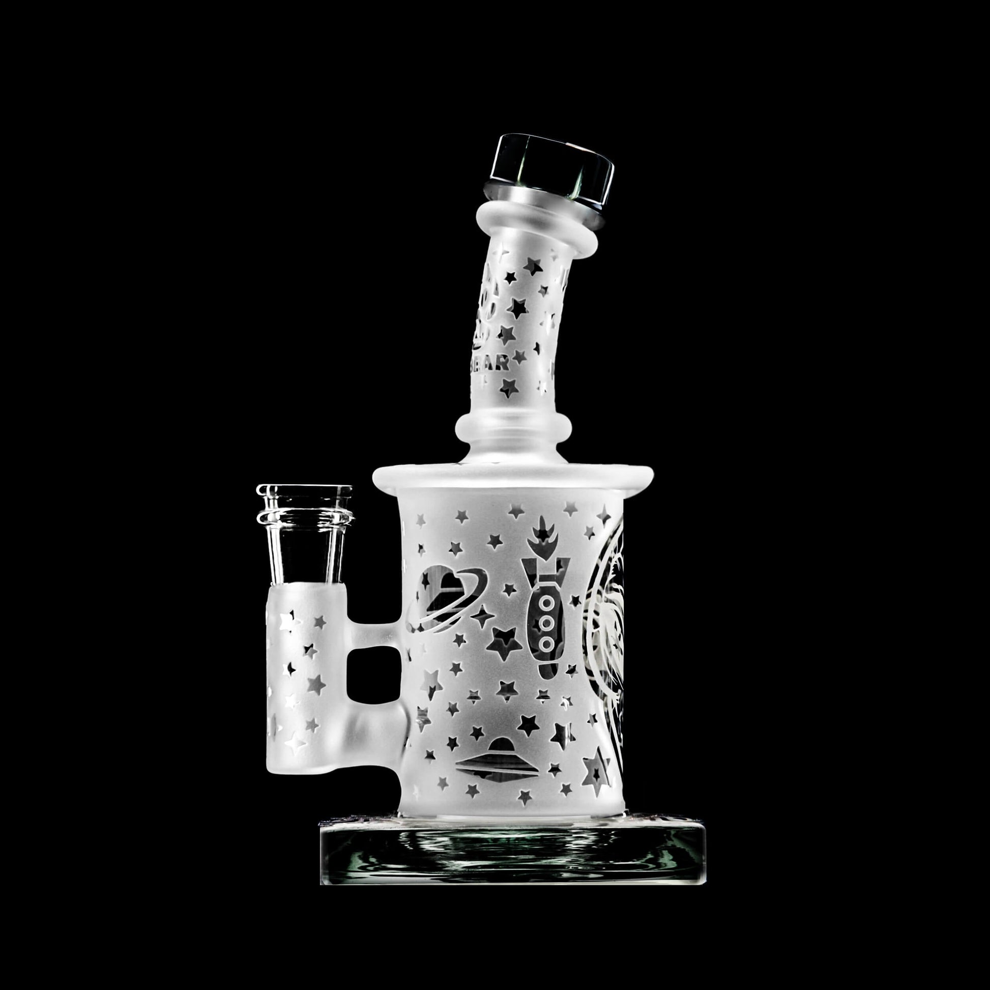 Calibear Premium frosted glass dab rig with deep sandblasted spaceship and star patterns featuring a Flower of Life percolator.