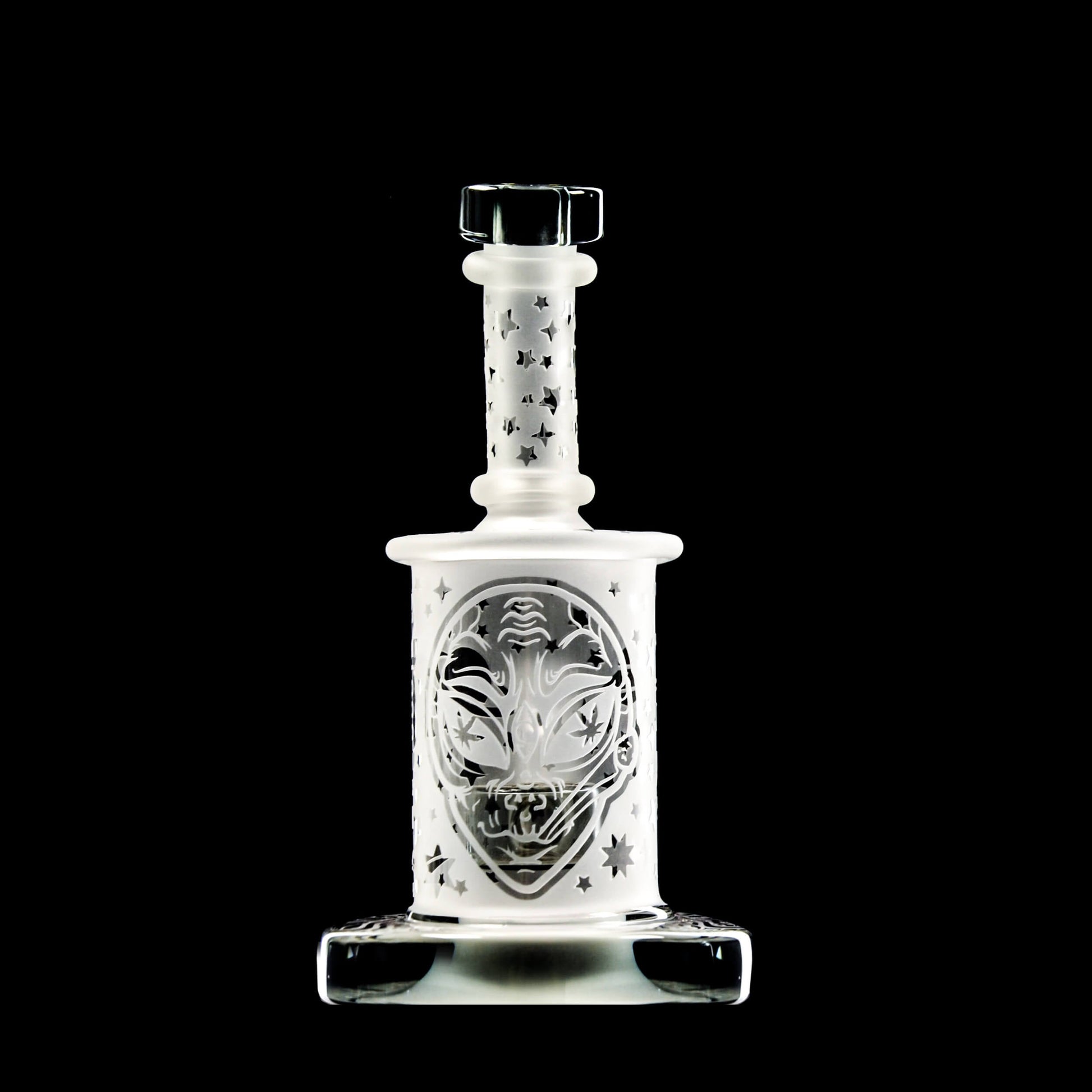 Calibear Premium frosted glass dab rig with deep sandblasted spaceship and star patterns featuring a Flower of Life percolator.