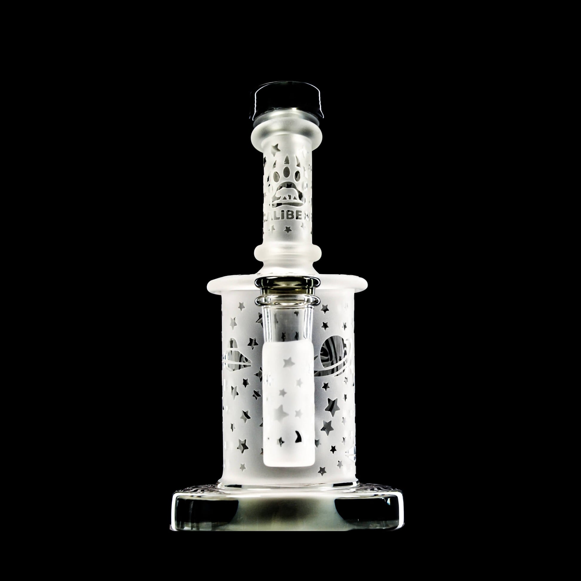 Calibear Premium frosted glass dab rig with deep sandblasted spaceship and star patterns featuring a Flower of Life percolator.